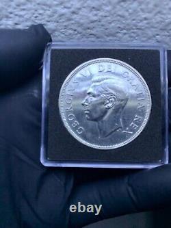 1949 Canada Silver Dollar. Proof Like. The Matthew discovering Newfoundland