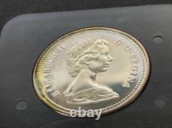 1973 Canada Commemorative Proof Dollar Heavy Toning in Mint Box
