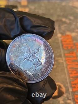 1973 Canada RCMP Centennial Proof Dollar Insane Rainbow Toned Gem