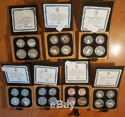 1976 CANADA Olympic 28 Sterling Silver PROOF Coins & 7 Wood Cases/Boxes & COA's