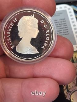 1986 Canada Proof Silver $1 Vancouver Centennial First Transcontinental Trail