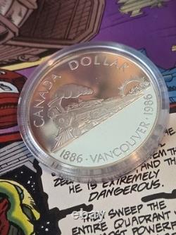 1986 Canada Proof Silver $1 Vancouver Centennial First Transcontinental Trail