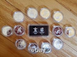 2010 VANCOUVER CANADA Olympics Set of 13 Silver PROOF Coins and Wafer
