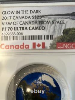 VIEW OF CANADA FROM SPACE PF70 GLOW IN THE DARK $25 2017 Pf70 ULTRA CMO SILVER