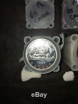 (lots of 20) 1965 CANOE mostly PROOF-LIKE SILVER CANADIAN SILVER DOLLAR COINS